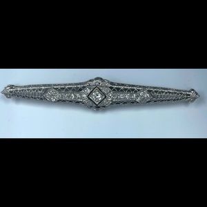 14 karat white gold and diamond Art Deco pin.